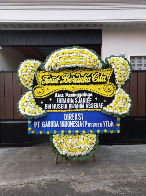 Papan Bunga Duka di Moya