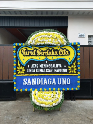 Papan Bunga Duka di Moya